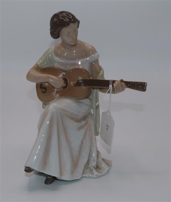 B & G model of a female guitarist